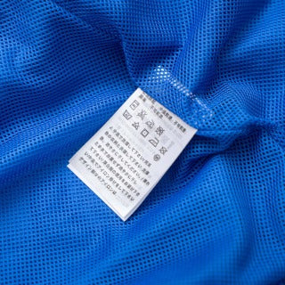 Coupe-vent à capuche Nike 2013 avec logo découpé au dos