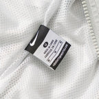 Coupe-vent à capuche Nike 2013 avec logo découpé au dos