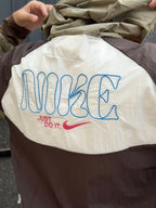Coupe-vent anti-UV brodé à capuche Nike 7680